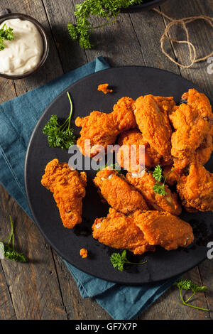 Spicy Deep Fried Breaded Chicken Wings with Ranch Stock Photo