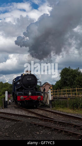 King Edward II restored steam train locomotive with steam running on the track at the Didcot Railway Centre at Didcot