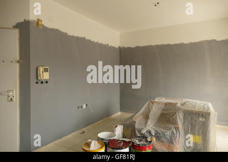 Repainting old apartment in gray. Stock Photo