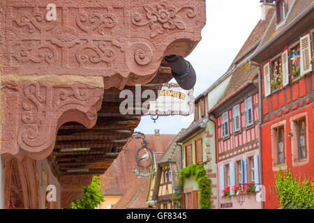 Colorful street in Riquewihr village. Stock Photo