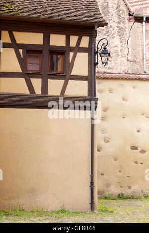 Colorful street in Riquewihr village. Stock Photo