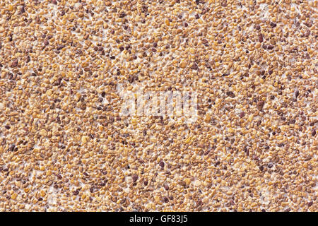pebble stones surface wall texture background Stock Photo
