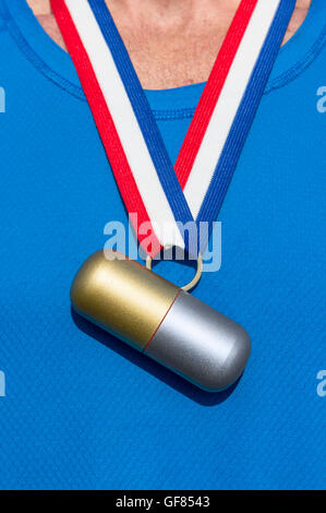 Cheating athlete with gold and silver medal capsule hanging from a red white and blue ribbon Stock Photo