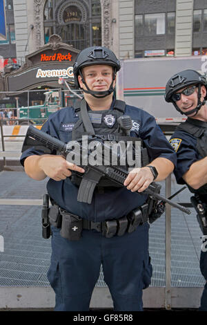 NYPD policemen in Times Square NYC Stock Photo - Alamy