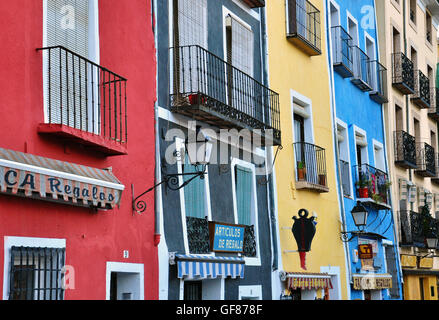 CUENCA, SPAIN - JANUARY 5: Multicolor houses of Cuenca city centre on January 5, 2012. Cuenca is a city in the Castile La Mancha Stock Photo