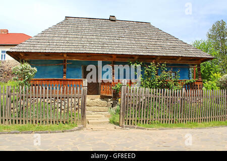 Old wooden house in museum of Folk Architecture in Uzhhorod, Ukraine Stock Photo
