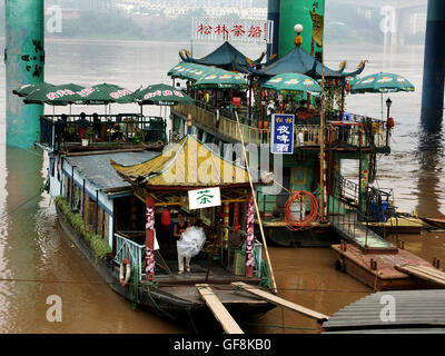 Floating restaurant at the quay in Ciqikou Ancient Town, a preserved part of old Chongqing, China. Stock Photo