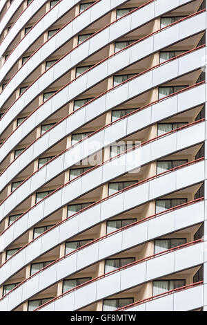 Modern curved glass balconies on a modern high-rise hotel tower Stock Photo