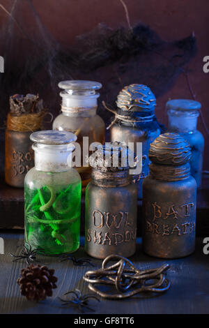 witch apothecary jars magic potions halloween decoration Stock Photo