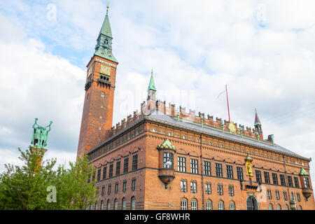 Copenhagen, the City Hall Palace with the Clock Tower and the Lur Blowers monument on the left Stock Photo