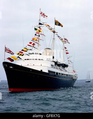 AJAXNETPHOTO. JULY, 1991. MILFORD HAVEN, WALES. - DRESSED OVERALL -  HMRY BRITANNIA AT MILFORD HAVEN FOR THE TALL SHIPS REGATTA. PHOTO:JONATHAN EASTLAND/AJAX REF:970920 Stock Photo