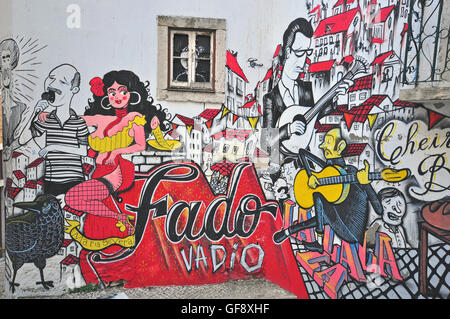 LISBON, PORTUGAL - DECEMBER 21: Graffiti of traditional portuguese fado on the street of Lisbon on December 21, 2013. Lisbon is Stock Photo