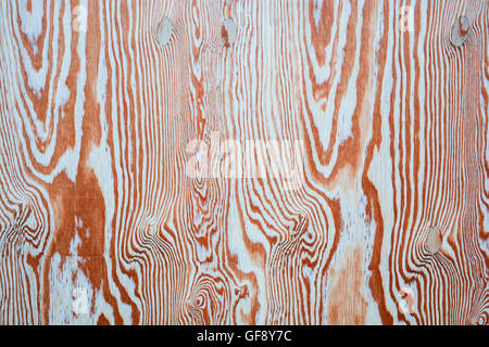 Wood background for graphic resources. Light brown, sinuous shapes, circular and linear. Stock Photo