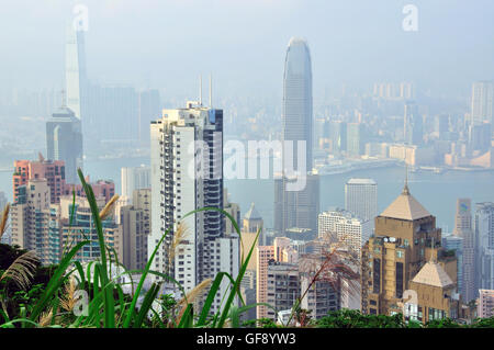 HONG KONG, CHINA - JUNE 6: Hong Kong downtown top view from Victoria peak on June 6, 2012. Stock Photo