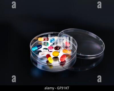 PROPERTY RELEASED. A variety of pills in a petri dish. Stock Photo