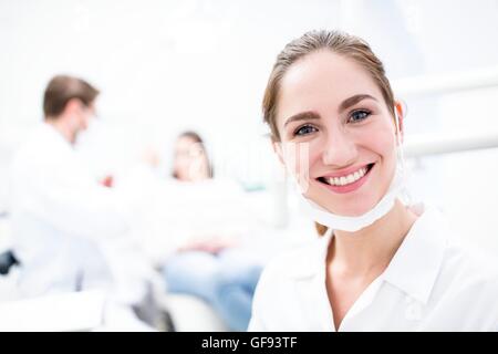 MODEL RELEASED. Close-up of young woman dentist, portrait. Stock Photo