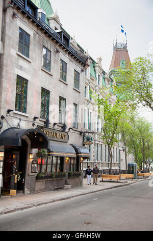 QUEBEC CITY - MAY 25, 2016:  Le Continental is a special-occasion destination for classic French cuisine, with flambé meals prep Stock Photo