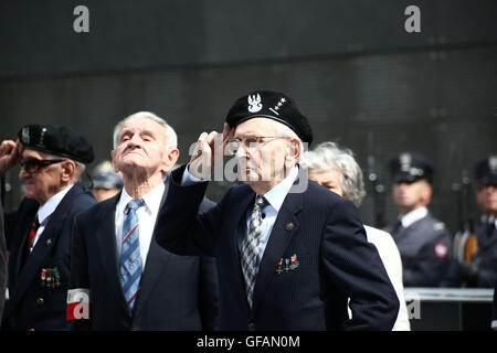 Warsaw, Poland. 30th July, 2016. President Andrzej Duda held speech at 72nd anniversary of the Warsaw rising of 1944 at the Warsaw Rising Museum. Participants of the rising of 1944 are honoured with state awards. Credit:  Jake Ratz/Alamy Live News Stock Photo