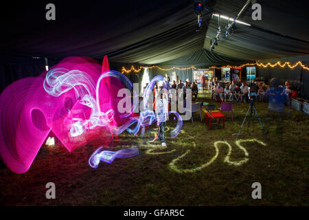 Charlton Park, UK. 29th July, 2016. Children take part in a light painting workshop in the Physics Pavilion at a sunny WOMAD Festival, 29 July 2016. Credit:  Adam Gasson/Alamy Live News