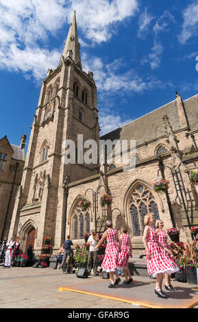 Durham, UK. 30th July 2016. The sun shines on Step This Way appalachian cloggers dance in Durham market square. (c) Washington Imaging/Alamy Live News Stock Photo