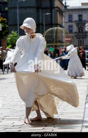 Glasgow, UK. 30th July, 2016. On the first day of the annual Merchant City Festival, held in the 'Merchant' district of Glasgow city centre, visitors, tourists and passers-by were treated to a free performance of contemporary dance. The Festival is being held from 30 July until 7 August Credit:  Findlay/Alamy Live News Stock Photo