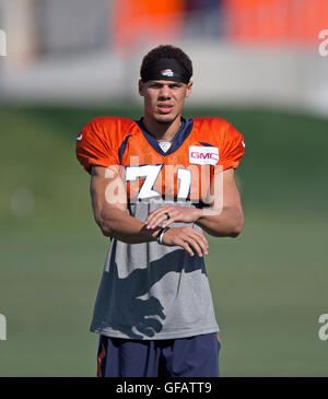 Englewood, Colorado, USA. 30th July, 2018. Broncos WR ISAIAH MCKENZIE gets  his pads adjusted before the start of passing drills during the Broncos  3rd. day of Training Camp at UC Health Training