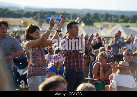 Carfest North, Bolesworth, Cheshire, UK. 30th July 2016. Fans watching The Corrs performing on the main stage. The event is the brainchild of Chris Evans and features 3 days of cars, music and entertainment with profits being donated to the charity Children in Need. Andrew Paterson/Alamy Live News Stock Photo