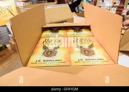 Toronto, Canada. 31st July, 2016. Book store staff ripped open packaging at exactly 12:01 AM. Harry Potter fans lined up at book stores around the world for the release of 'Harry Potter and the Cursed Child', the first new Potter book since 2007. Credit:  Victor Biro/Alamy Live News Stock Photo