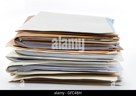 Pile of files on plain background Stock Photo