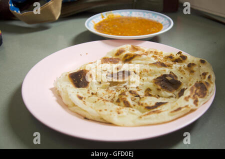 Roti Mataba with tuna massaman curry malaysian style in Resturant at Georgetown city and street art area in Penang, Malaysia. Stock Photo