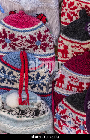 Knitted Scandinavian caps on a market in Vilnius, Lithuania Stock Photo