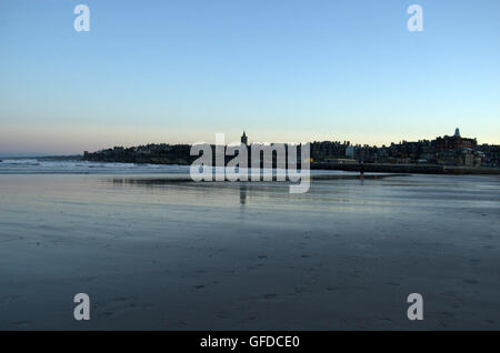 View of St Andrews from West Sands at dusk, St Andrews, Fife, Scotland Stock Photo