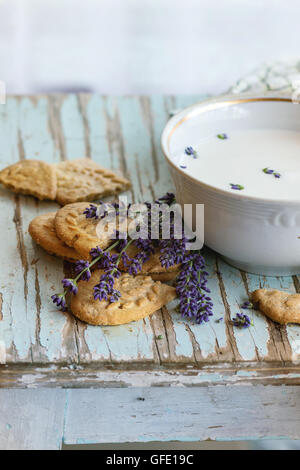 Lavender cookies with milk Stock Photo
