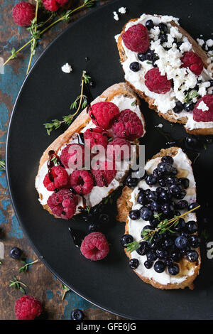 Dessert sandwiches with berries Stock Photo