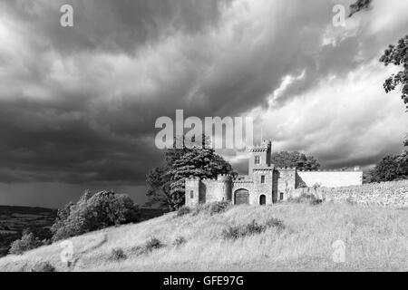 The local folly known as Rodborough Fort or Fort George in monochrome on Rodborough Common, Stroud, Gloucestershire, England, UK Stock Photo