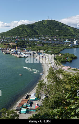 Beautiful summer city landscape: view of port Petropavlovsk-Kamchatsky, Avacha Bay, and Mishennaya Mountain. Far East, Russia. Stock Photo