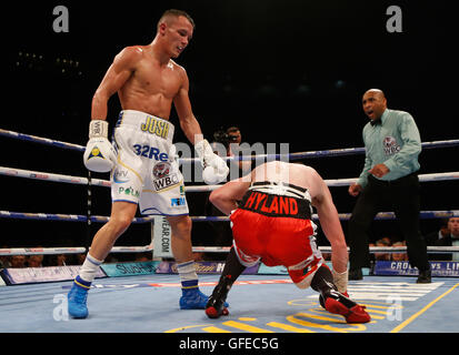 Josh Warrington (left) and Patrick Hyland during the WBC International Featherweight Championship bout at the First Direct Arena, Leeds. Stock Photo