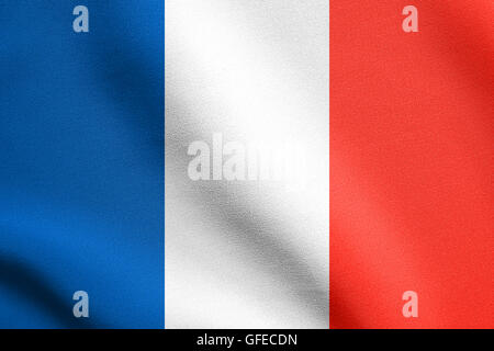 Flag of France waving in the wind with detailed fabric texture. French flag. Stock Photo