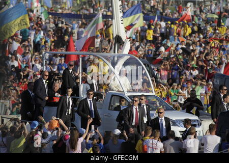 Brzegi, Poland. 30th July, 2016. Pope Francis drives with the papa mobile through the crowds at Campus Misericordiae. Over one million pilgrims came to the night vigil at Campus Misericordiae to celebrate the vigil together with Pope Francis. Many of the pilgrims stay over night for the final mass of World Youth Day 2016 with Pope Francis. © Michael Debets/Pacific Press/Alamy Live News Stock Photo