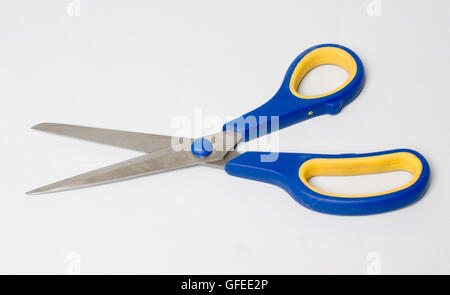yellow and blue office scissors on white Stock Photo