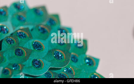Blue green peacock colored paper background with glitter Stock Photo