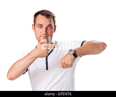 Worrier man running out of time looking his watch isolated on a white background Stock Photo