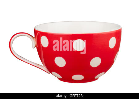 Front view of a red tea empty cup with dots isolated on white Stock Photo