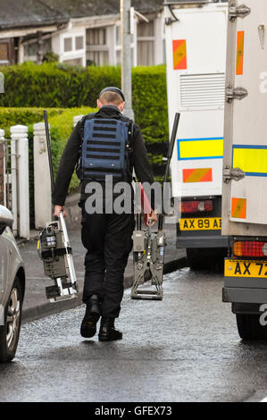 Belfast, Northern Ireland. 30 Dec 2013 - Parkgate Avenue in East Belfast was closed following the discovery of a suspicious object.  Army ATO were tasked to examine the object. Stock Photo