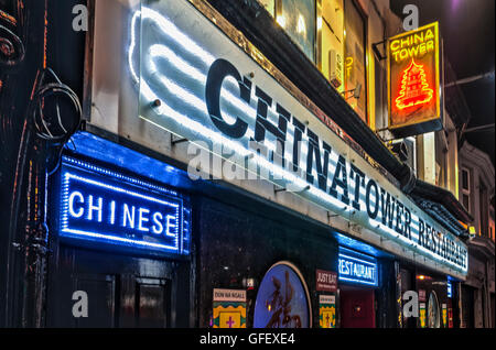 Chinese restaurant with neon signs outside Stock Photo