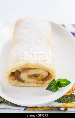 roulade with pear filling, mint and cup Stock Photo - Alamy