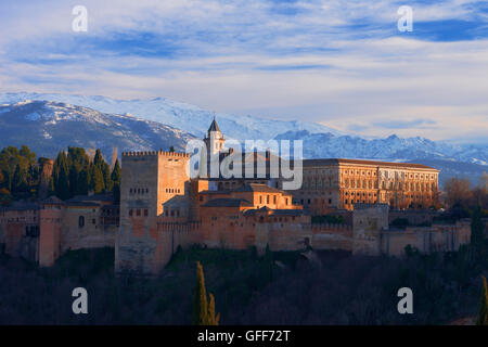 Alhambra, UNESCO World Heritage Site, Sierra Nevada and la Alhambra at Sunset, Granada, Andalusia, Spain. Stock Photo