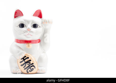 Japanese silver beckoning cat called Manekineko also known as a lucky cat Stock Photo