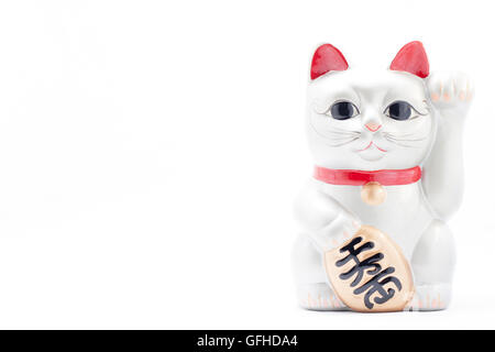 Japanese silver beckoning cat called Manekineko also known as a lucky cat Stock Photo