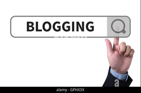 BLOGGING man pushing (touching) virtual web browser address bar or search bar Stock Photo
